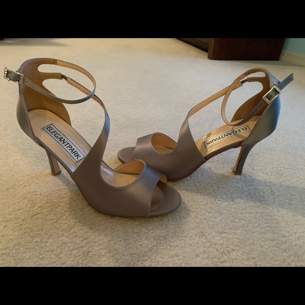 Like new pair of steel gray shoes. Worn once.